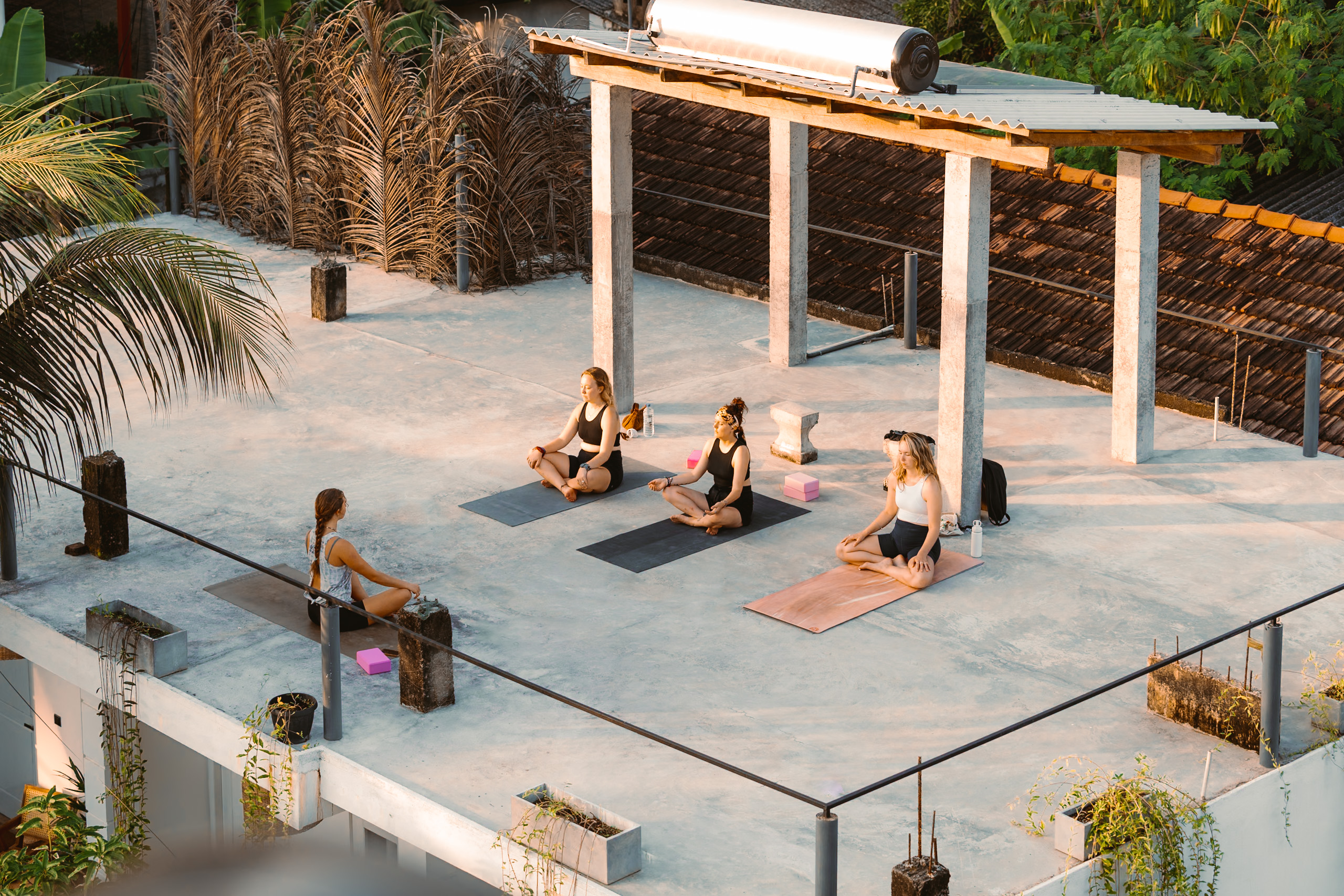 yoga lesson on rooftop of Lucky's surf camp in Weligama